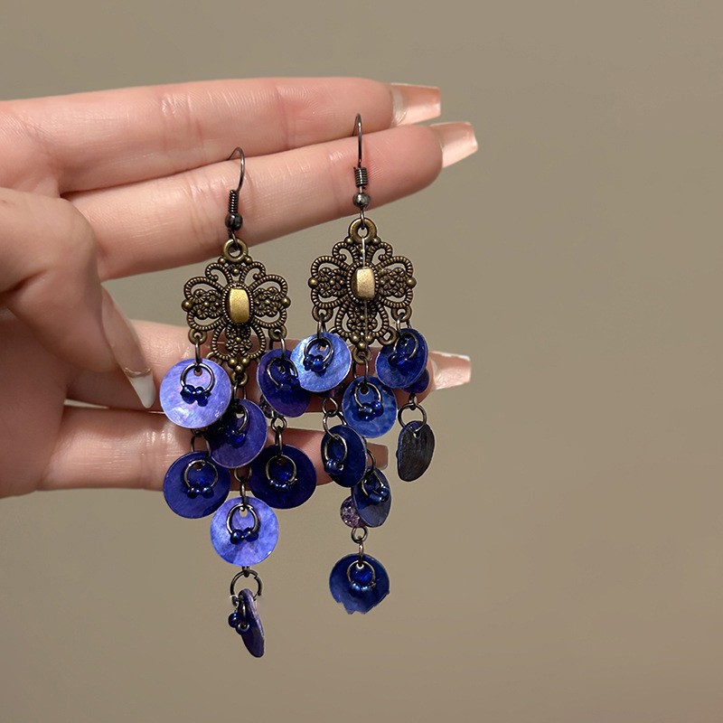 Pendientes de borla de concha geométrica redonda, estilo de vacaciones junto al mar, gancho para la oreja, pendientes de todo fósforo de moda, sentido de clase alta de nicho