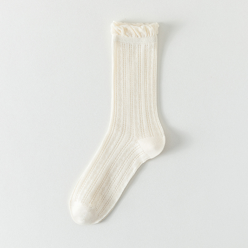 Calcetines de tubo medio Calcetines de algodón de color sólido para mujer delgada de verano Calcetines de confinamiento deshuesados Calcetines de pila de malla Calcetines de mujer Zhuji al por mayor