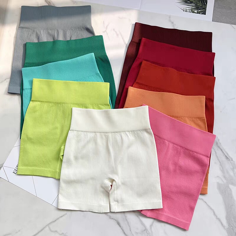 New seamless knitted sports shorts women's high waist hip lifting riding three pants running fitness yoga tight shorts