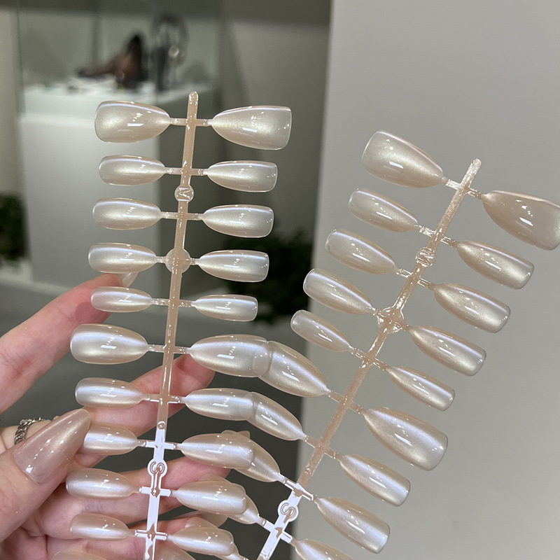 Nude color wide cat-eye press-on nails, new medium almond shape, sweet and translucent, gentle style, 30-piece fake nail set wholesale Nude color wide cat-eye press-on nails, new medium almond shape, sweet and translucent, gentle style, 30-piece fake nail set wholesale