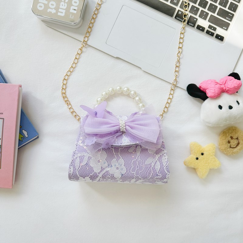 Bonito pequeño viento de la princesa viento bolso de perlas bolso de mano bolso de hombro para niños arco