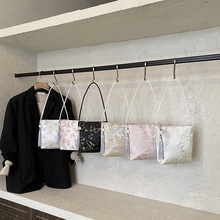 新中式包包女士2025新款时尚百搭休闲单肩包大容量超火通勤水桶包