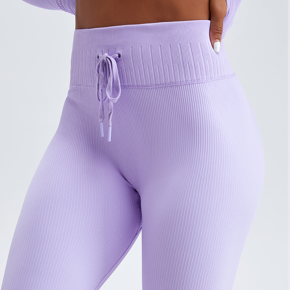 Pantalones de Yoga de cintura alta de hilo transfronterizo para mujeres Otoño e Invierno nuevos pantalones de fitness de levantamiento de cadera de melocotón deportivo desnudo ajustado con cordones