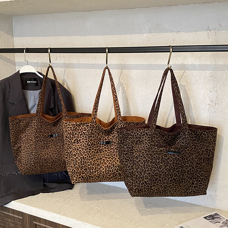 Europa y los Estados Unidos retro leopardo para hombres y mujeres bolsos de hombro bolsos de viaje de gran capacidad bolsos de mano de cacho de invierno niños bolsos de mochila