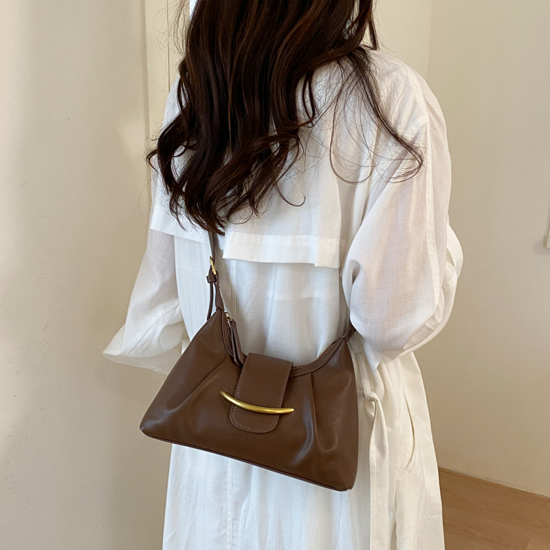 La versión coreana de nicho Zhong commuting bolsas de bolsillo superfuego 2026 verano nuevo estilo diario ocio de moda extranjera mochila de hombro