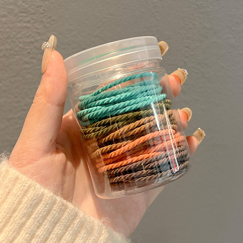 50 hilo negro embotellado cuerda de pelo fino cuerda de pelo al por mayor pequeña banda de goma banda de pelo cabeza de lazo femenino headwear anillo de goma cubierta de cuero