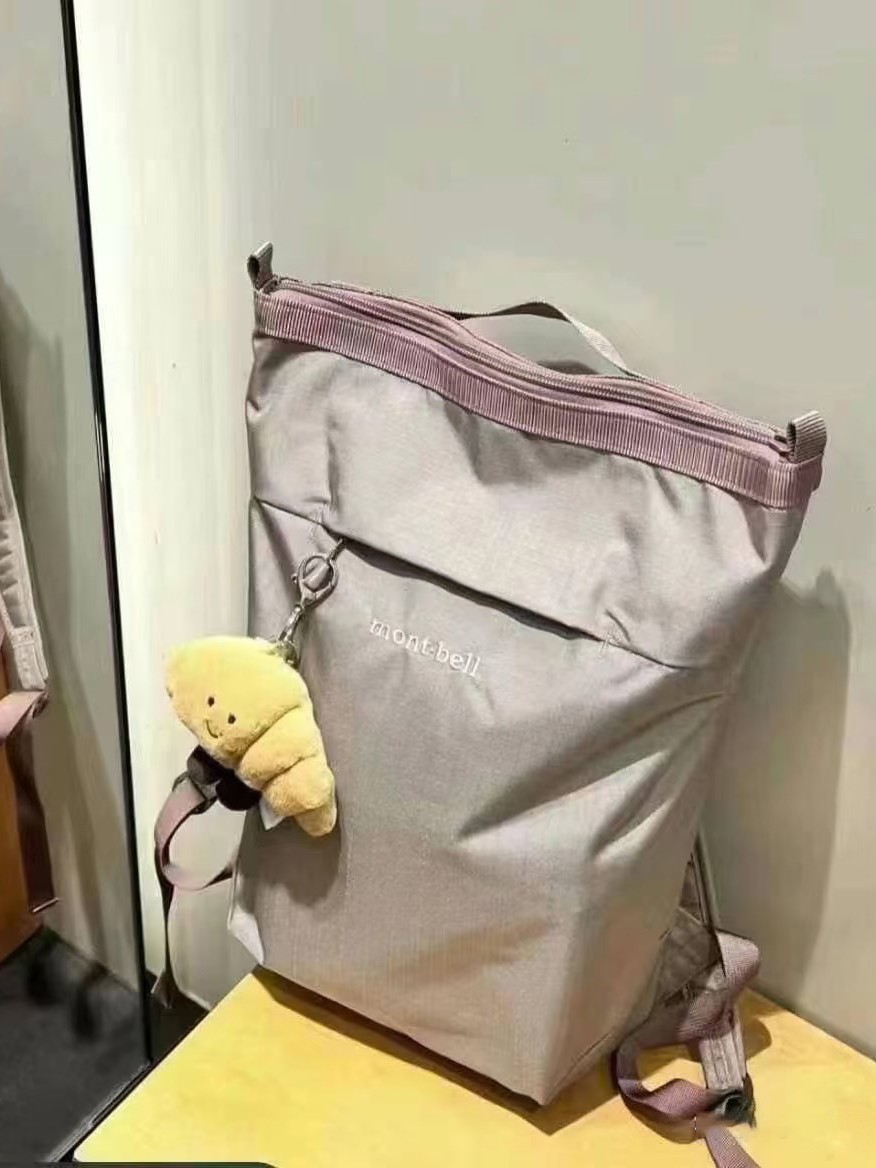 スポットモンベルバックパック女性のアウトドアレジャー旅行バッグコンピュータバックパック男の子 10L 大容量スクールバッグ