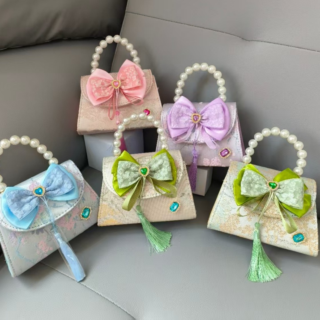 Bolsa portátil de la princesa de perlas estilo nacional arco de hombro bolso de cadena bolso pequeño bolso de cambio de Año Nuevo