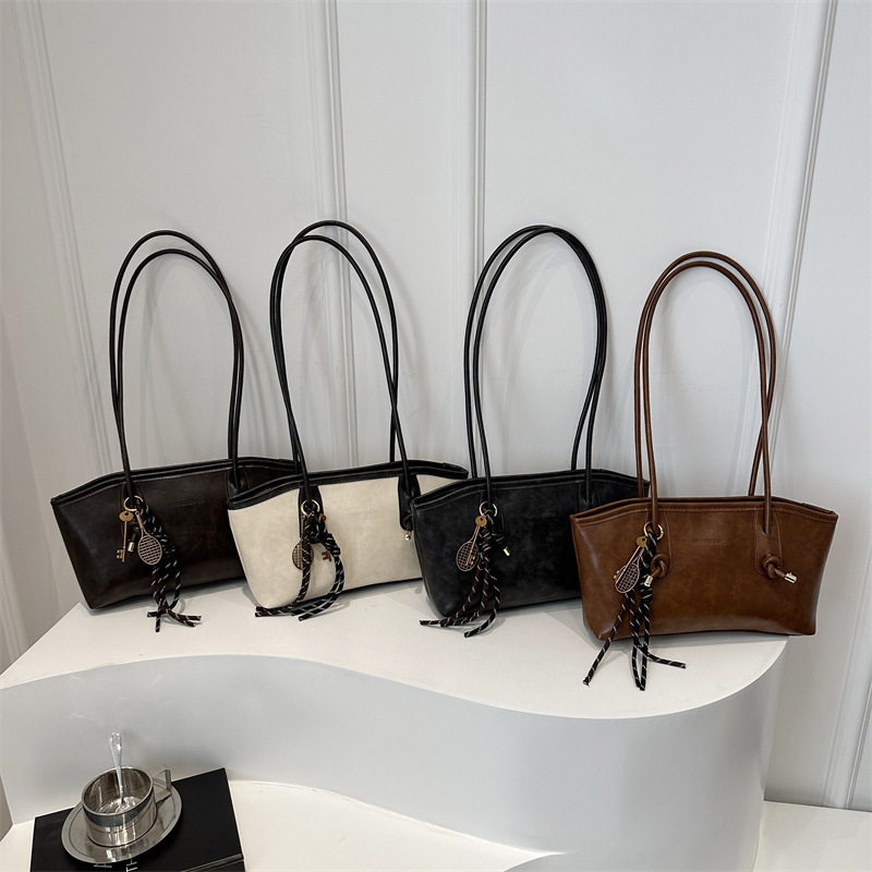 Commuting mujeres de color sólido 2024 nuevo otoño invierno retro moda texturas colgantes casuales de hombro bolso