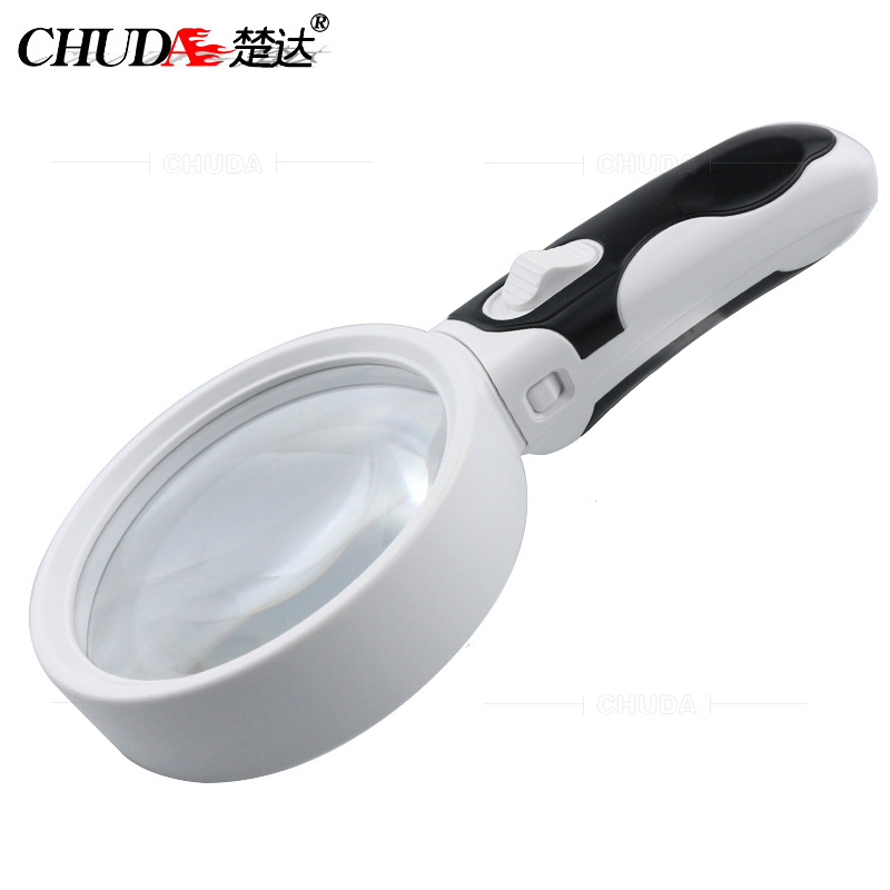 Rubber handheld magnifying glass with light
