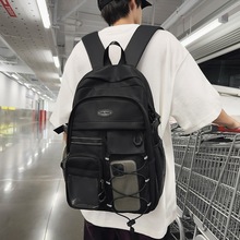 新款大学生书包男高中生时尚电脑双肩包轻便大容量初中生旅行背包