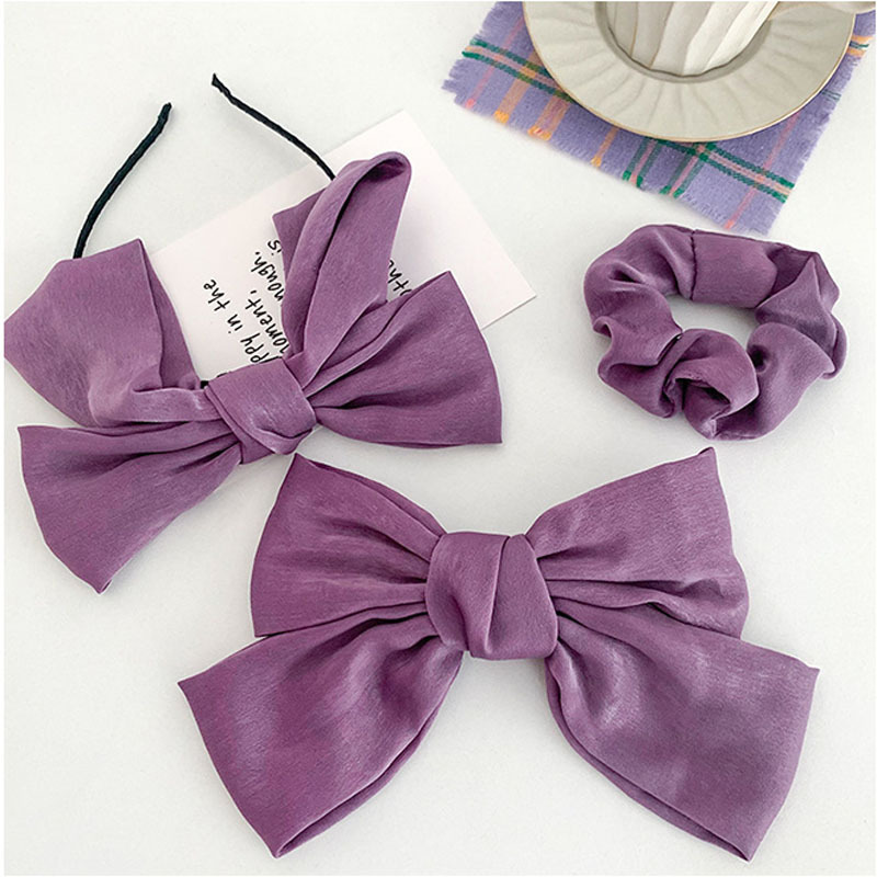 Women's Sweet Bow Knot Cloth Hair Clip Hair Band display picture 1