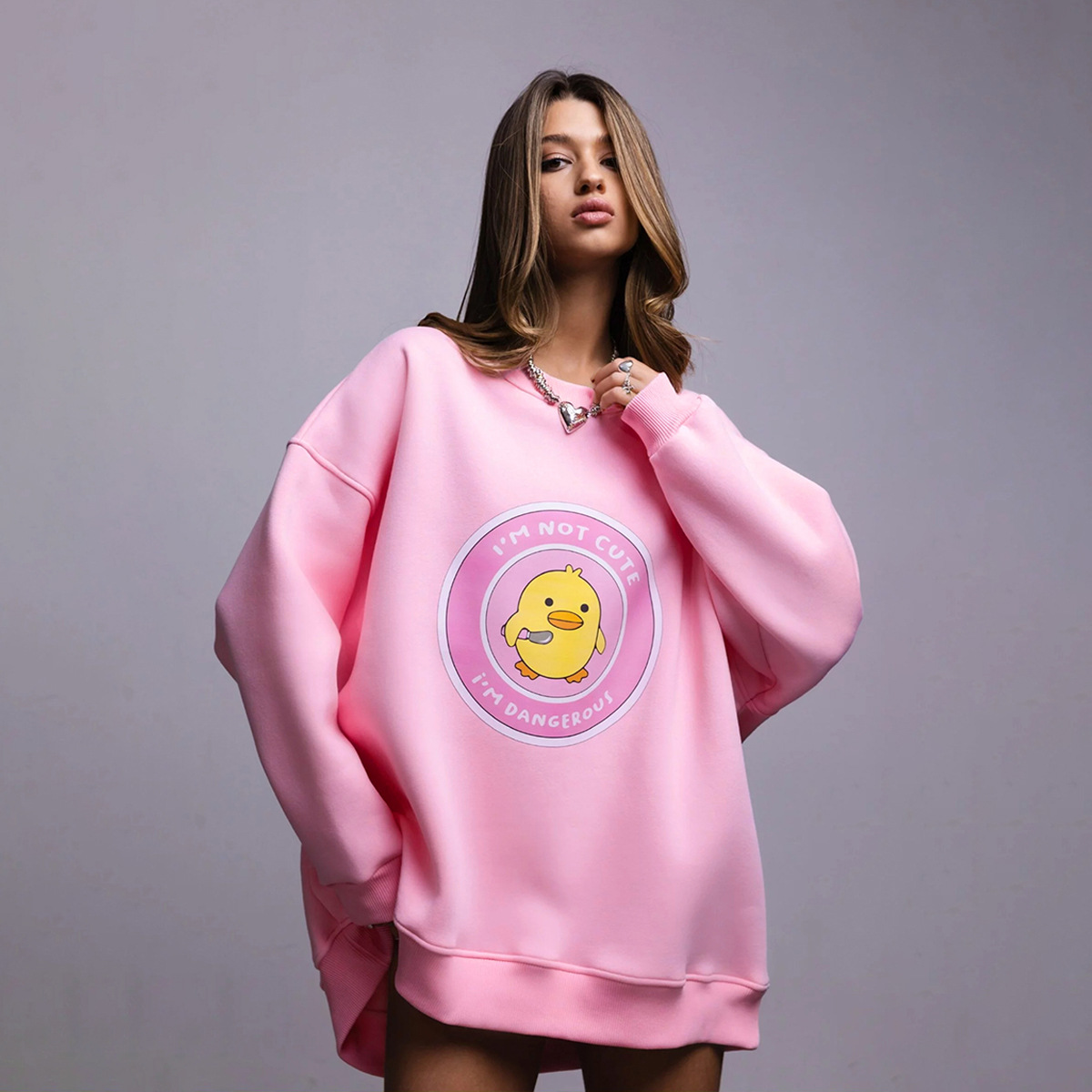 Transfronterizos cuello redondo impresión jersey Europa y América 2025 otoño nuevo estilo de mujer estilo deportivo pato amarillo + letras impresión jersey