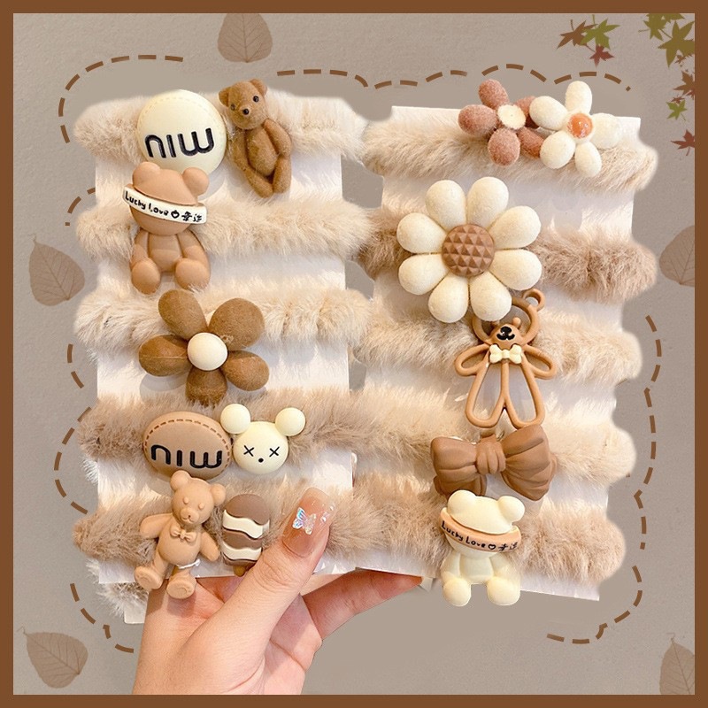 Otoño e Invierno nueva banda de pelo de peluche de dibujos animados leche marrón arco flor pelo cuerda traje Internet celebridad mismo estilo soporte generación pelo
