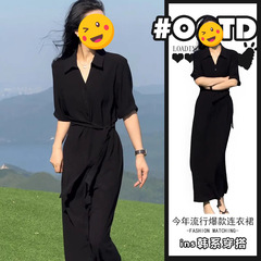 2025夏の超火の新型高冷お姉さん風のワンピースの女性の高級感の独特な黒色は腰を収めてやせている長いスカートを現します。