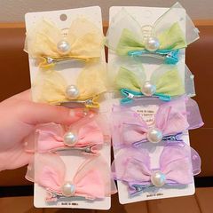 韓国の小さい清新な子供のヘアピンの網の糸の蝶結びの真珠のヘアピンの側はかわいい赤ちゃんを挟んで髪の飾りを傷つけません。