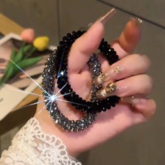シンプルな気質の女性用輝くダイヤモンドヘアバンド 2025 新しいハイエンドブレスレットヘアロープ高弾性ゴムバンドポニーテールヘッドロープ