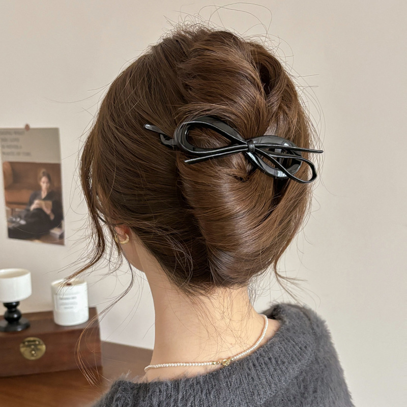 Alto grado de sensación de leopardo arco torsión clip de cabello temperamento disco de cabello una palabra agarrar clip de cabello para mujeres 2025 nuevo toque de cabello