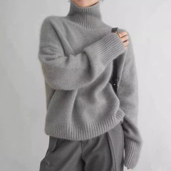 韓国版の純色のカシミヤは厚くて高襟の女性を厚くしてゆったりしています。