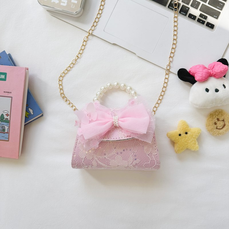 Bonito pequeño viento de la princesa viento bolso de perlas bolso de mano bolso de hombro para niños arco