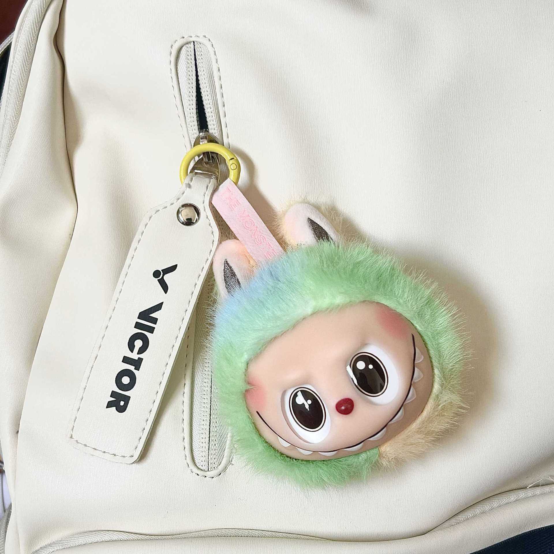 Caricaturas lindas peluche tela de tela llavero regalo creativo bolsas colgantes estandos pequeños productos