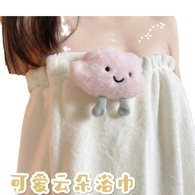 お風呂のスカートのバスタオルの髪の帽子の女性は家庭用のお風呂を包むことができます。|undefined