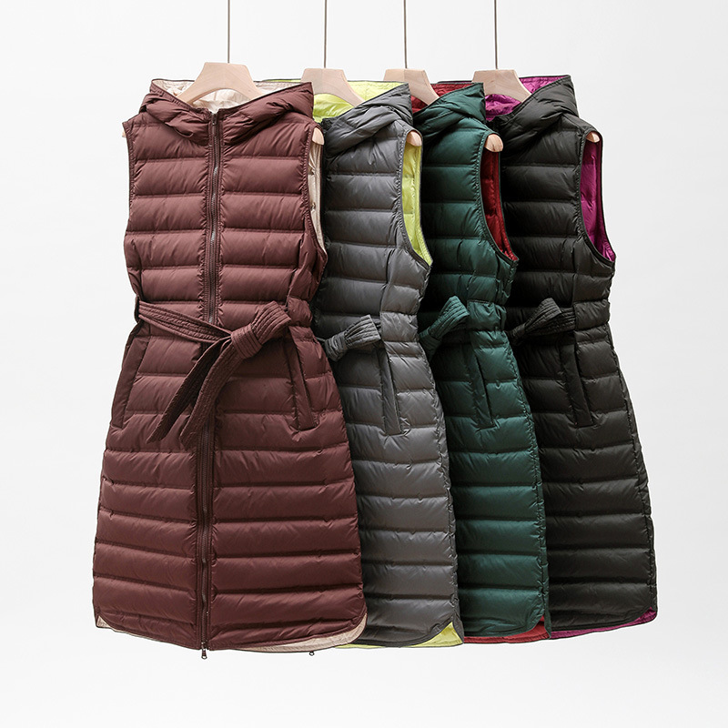 Seamless fabric autumn and winter new lightweight down vest women's long hooded over-the-knee waist slim contrast color vest cross-border Seamless fabric autumn and winter new lightweight down vest women's long hooded over-the-knee waist slim contrast color vest cross-border
