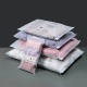 in stock anti-suffocation warning zipper bag clothing packaging bag cross-border foreign trade general warning plastic self-sealing bag
