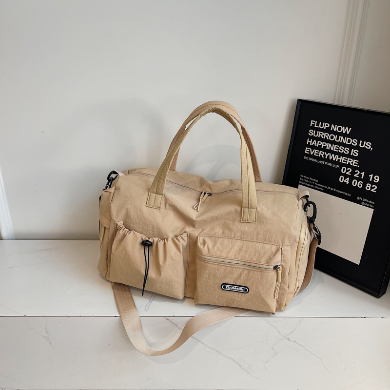 2025 nueva bolsa de viaje de gran capacidad para mujeres ligera separación seca y húmeda nadadora bolsa de equipaje de gimnasio portátil