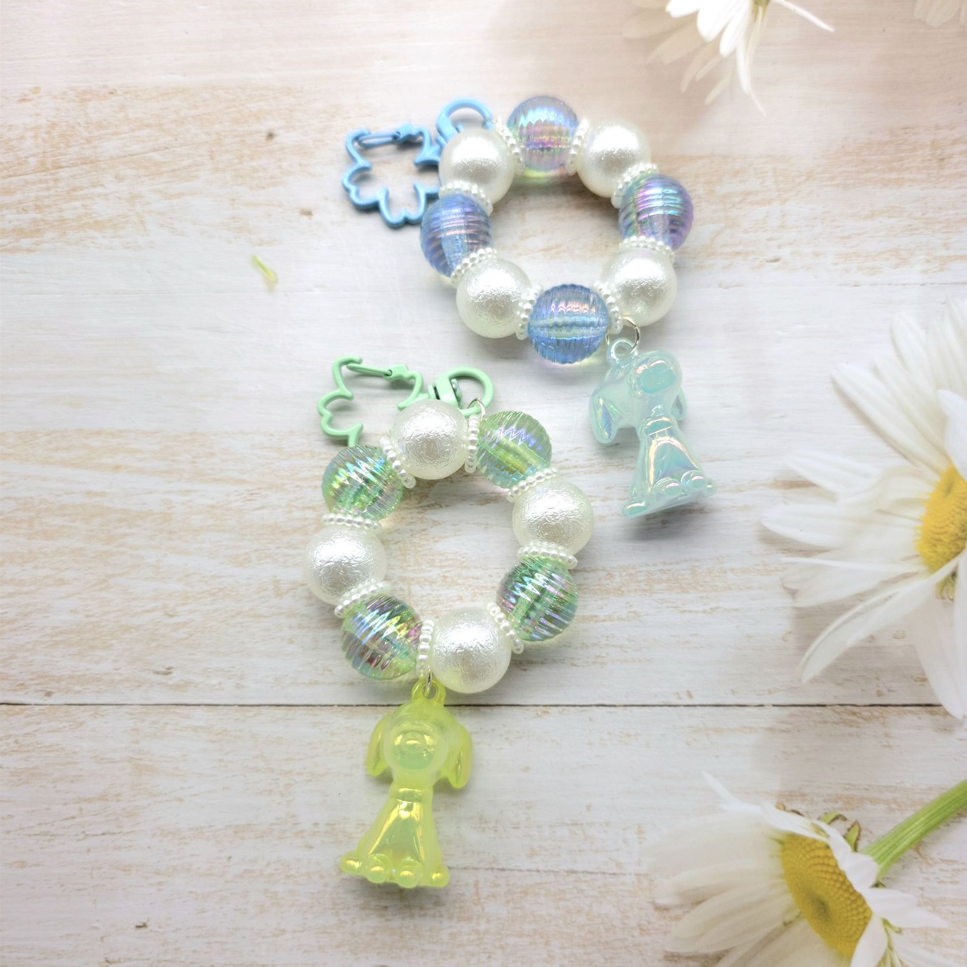 2023 nueva ronda de cadena de cuentas llavero colgante cadena de teléfono móvil colorido fresco perla luminosa color sólido accesorios auricular