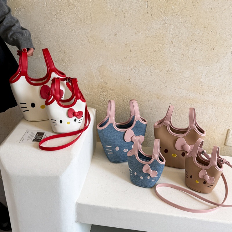 Korean-style cute and unique Hello Kitty hand-held bucket basket bag, new Japanese-style simple and versatile shoulder and crossbody bag Korean-style cute and unique Hello Kitty hand-held bucket basket bag, new Japanese-style simple and versatile shoulder and crossbody bag
