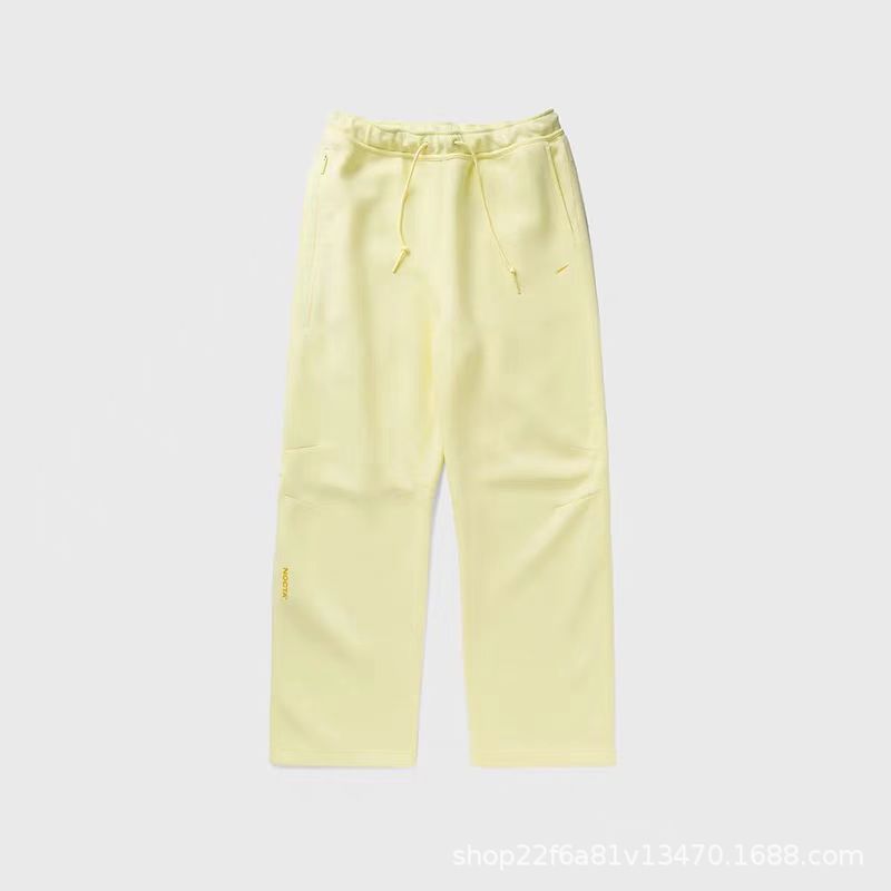 Nike NOCTA Tech Fleece Sweatpants Open Hem Citron Tint