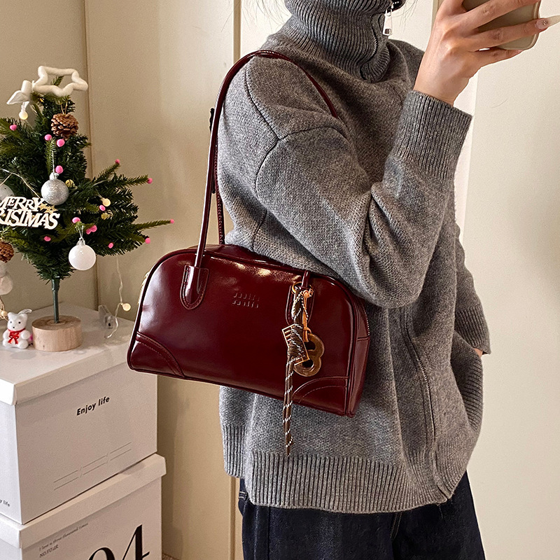 Transfronterizos de alto nivel bolsos portátiles de Boston mujeres otoño / invierno 2025 nueva moda bolsos axilales de gran capacidad bolsos de hombro
