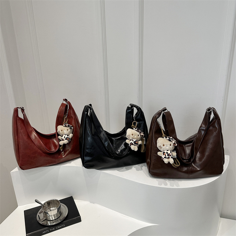 Moda de viaje de moda de gran capacidad bolsas de color sólido para mujeres 20 simple retro nuevo hombro bolsas coreanas transfronterizas