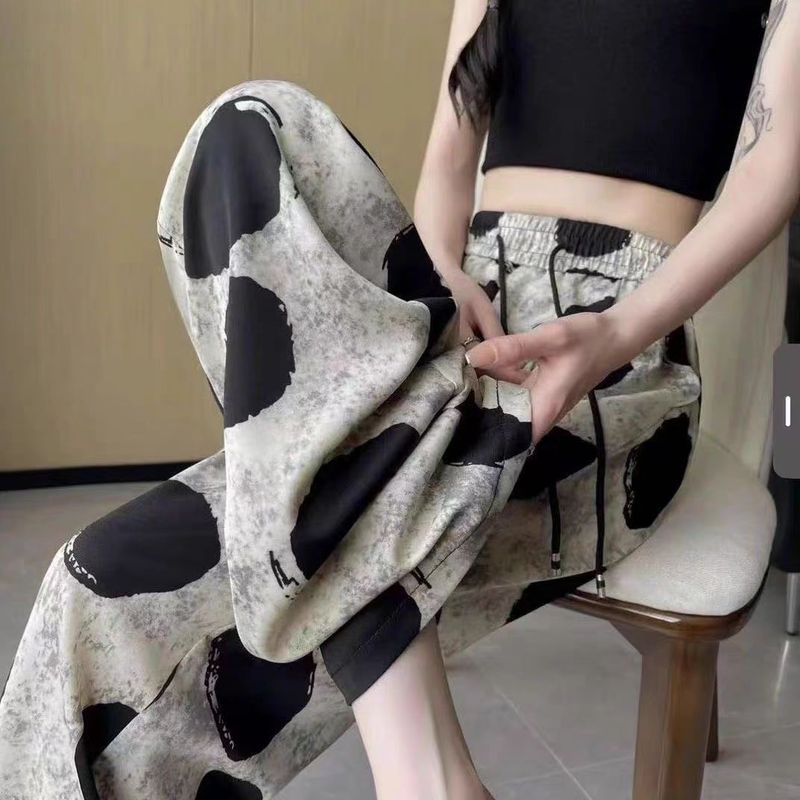 西洋スタイルのファッショナブルなレトロな水玉模様のアイスシルクワイドレッグパンツ女性のための 2025 新デザインニッチルーズドレープカジュアルパンツ|undefined