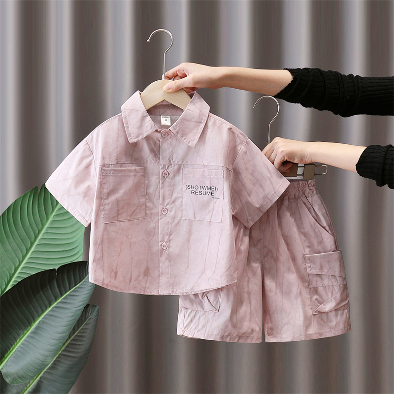 7145 Traje de verano para niños 2025 Nuevo estilo para niños Camisa coreana de herramientas de manga corta Traje de dos piezas de la calle frita de verano para bebés