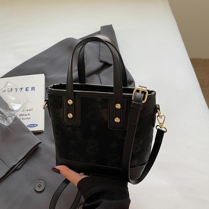 Bolso de mano popular, dama 2025, nuevo estilo de moda, bolso de hombro de color, bolso de cubo de alta calidad.