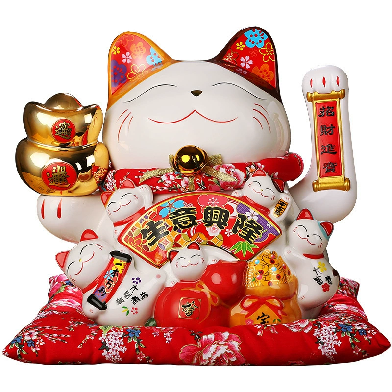 7 -inch wealth cat ornament shakes hands.