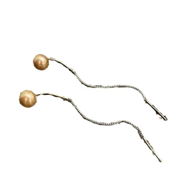 Nuevos cuentas de champagne con bordillos largos, líneas de orejas delgadas, diseño de personalidad simple y sofisticado, auriculares de alta calidad