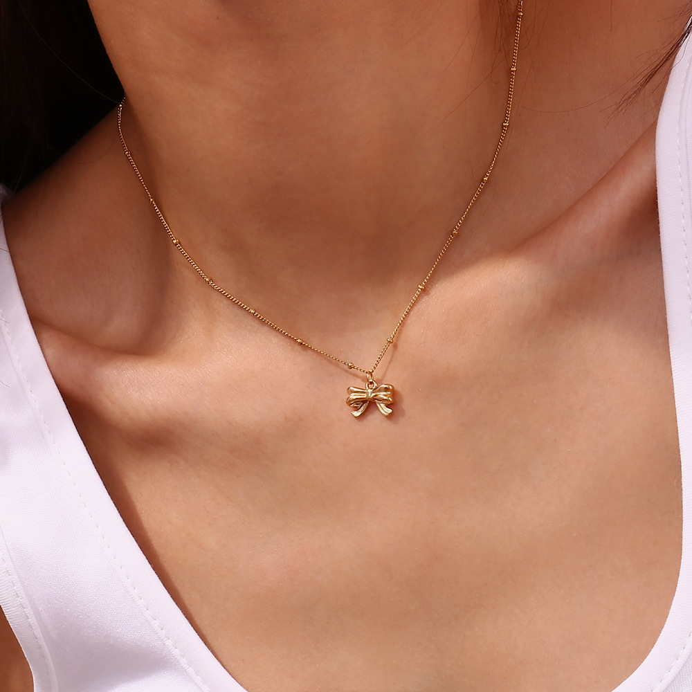 10g Weight 0.03µm-0.05µm Gold Plating Thickness PVD Coated Gold Plating Process 18K Real Gold Plated Plating Material Stone-Free Inlay Material Earrings, Necklace Classification Earrings + Necklace Quantity Daily Occasion 304 Stainless Steel Material Bow Knot Pattern Women's Gender Elegant Style Waterproof Non Tarnish Craft PVD Coated Real Gold Plated 18K Gold Bow Knot 316L Stainless Steel Elegant Waterproof Non Tarnish Surgical Steel Earrings Necklace 10