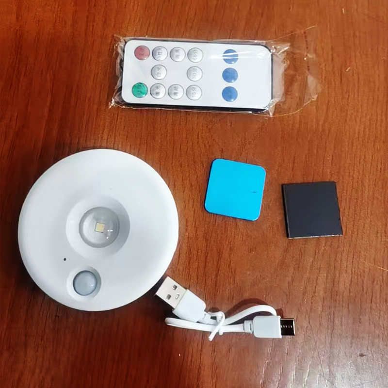Transfronterizos led hill spotlight inalámbrico armario de carga lámpara armario vinero ojo de gato luz de control remoto redonda luz de noche