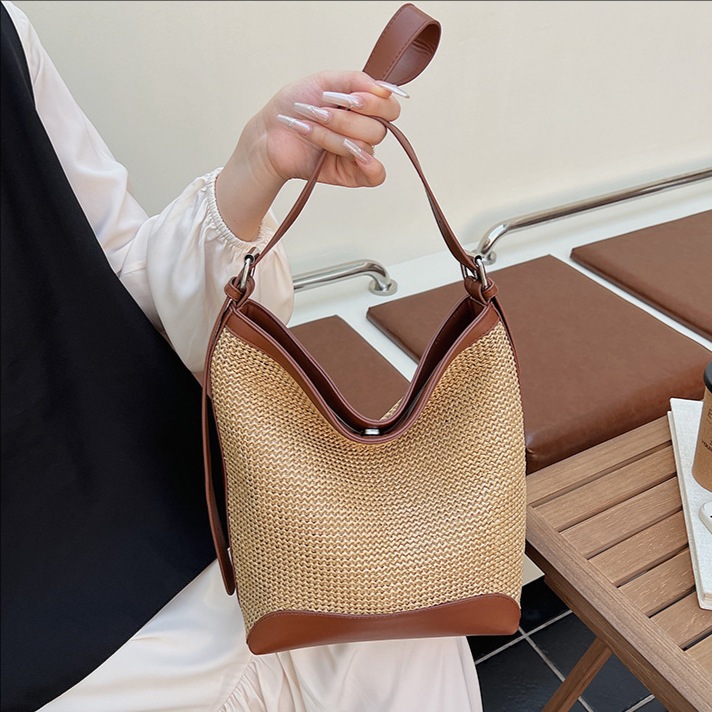 2025 verano nuevo estilo bolso tejido coreano bolso de hombro simple y versátil bolso de axila de gran capacidad bolso de cubo de tendencia de moda