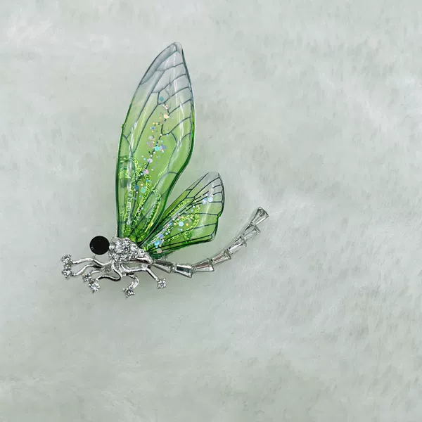 White K green dragonfly