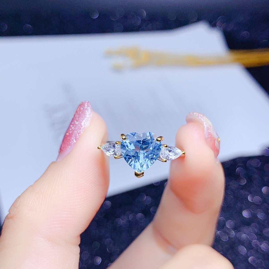 New Imitating Natural Heart-shaped Sky Blue Topaz Color Treasure Opening Ring display picture 2