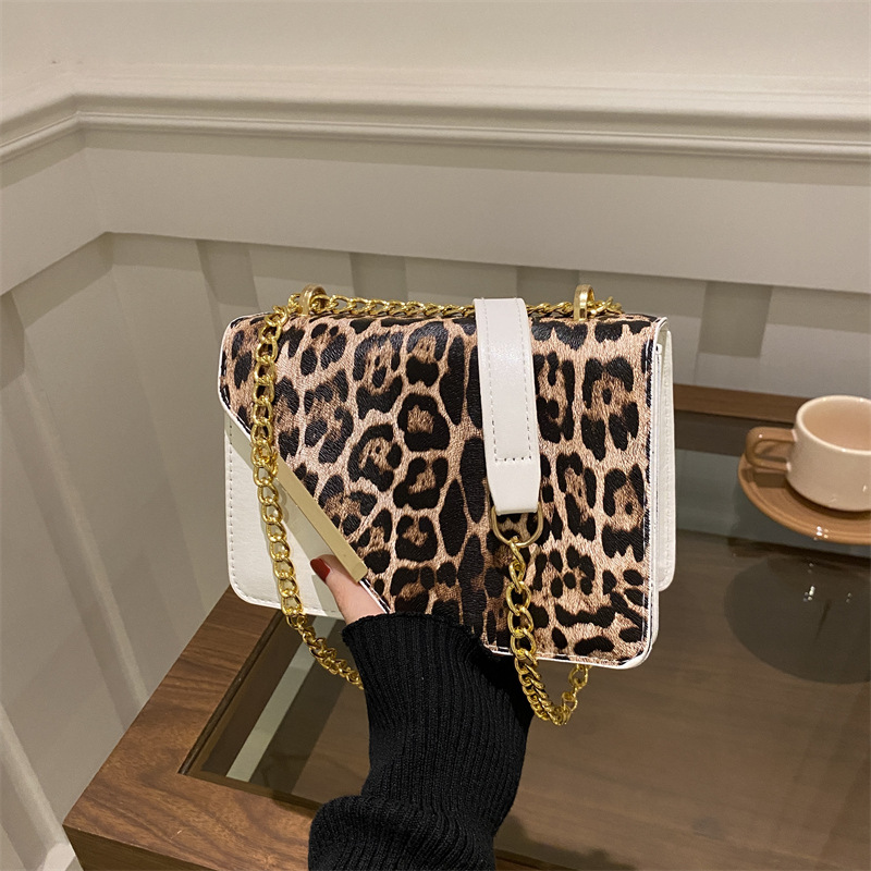 2024 invierno nuevo nicho diseño leopardo bolso de hombro de moda simple bolso de brazo cadenas mochila personalidad
