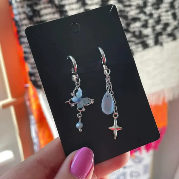 Cross-border blue asymmetric earrings for women, European and American hip-hop style, cool and stylish butterfly earrings with four-pointed star pendants, wholesale
