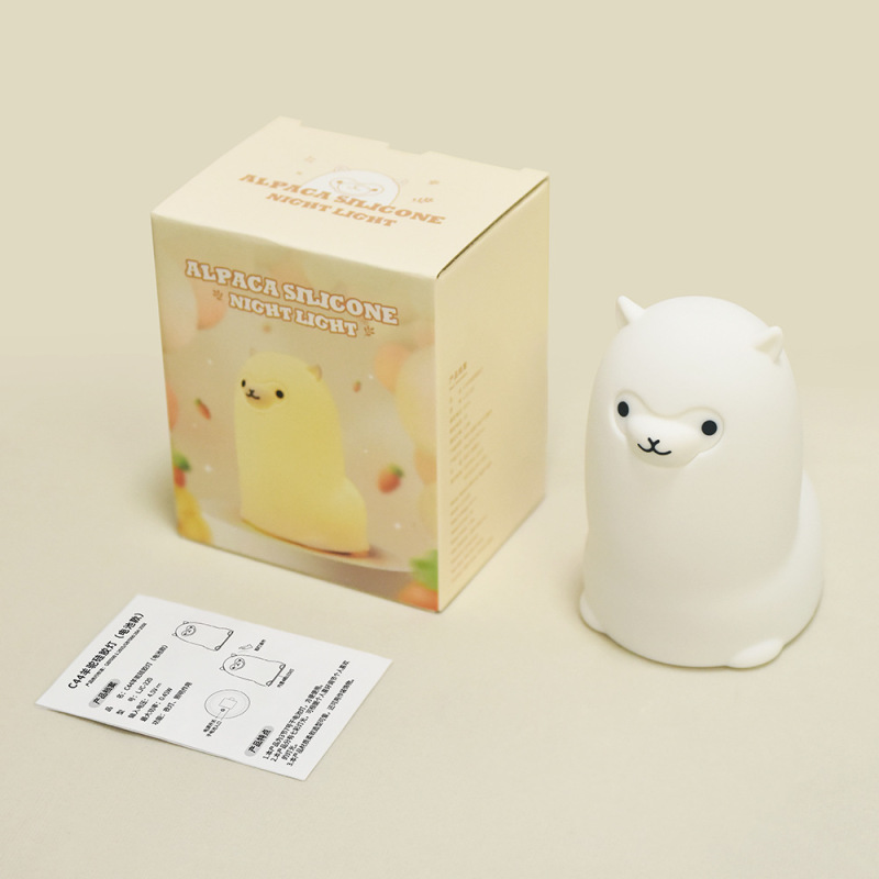 アルパカのシリコンのランプは明かりをたたいてかわいいプレゼントを保護します。|undefined