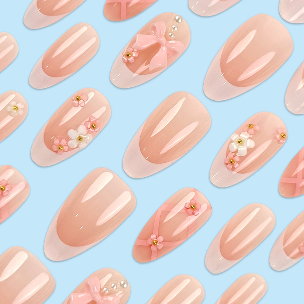 Uñas postizas estilo Hot Girl con borde blanco, puntas de uñas con lazo de alta gama, uñas postizas almendradas más vendidas transfronterizas.
