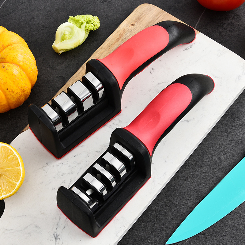 Fábrica mayorista de acero inoxidable doméstico multifuncional tres o cuatro piezas afiladora de cuchillo de cocina manual afiladora