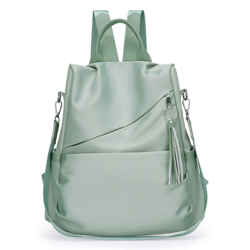 2023 nuevas damas casuales tela Oxford mochila antirrobo moda borla mochila de viaje multifuncional cabello